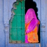 veiled-woman-in-a-window-jodhpur-rajasthan-india