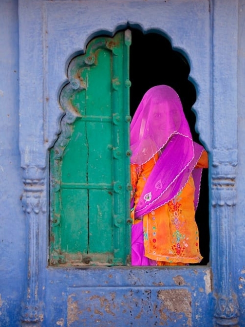 veiled-woman-in-a-window-jodhpur-rajasthan-india